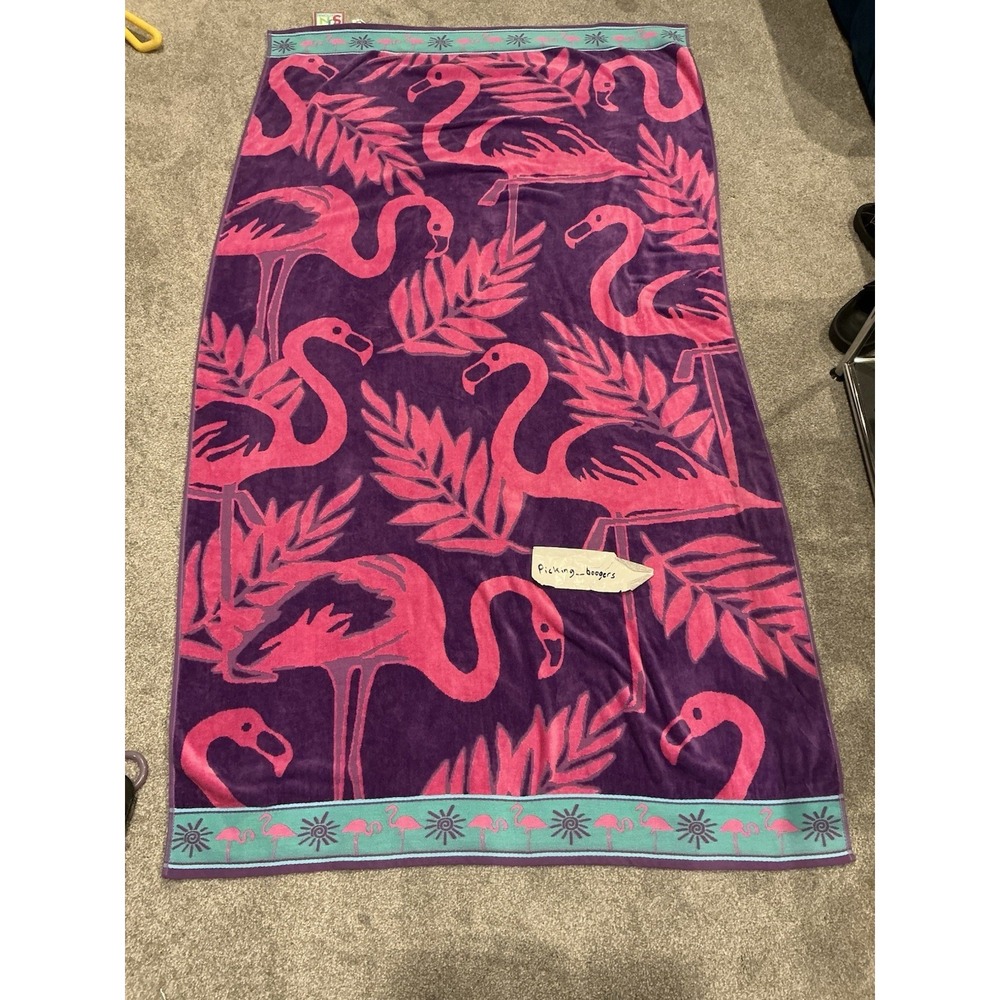 Pink and purple flamingo design cotton beach towel by Jay Franco & Sons